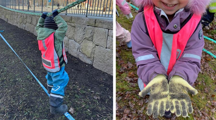 Ett Förskolebarn klättrar fram längst två rep genom att att balansera och hålla i sig med händerna. Ett annat barn visar fram smutsiga fingervantar.
