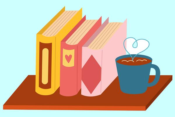 Ett litet bord med en kaffekopp och tre böcker.